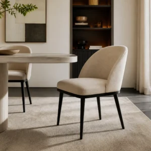 Mira Dining Chair in beige upholstery with black legs