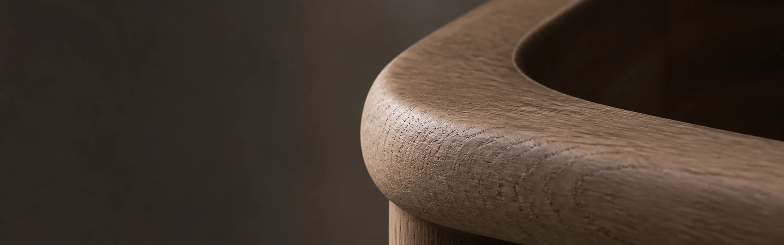 Close detail of natural oak grain and tactile furniture joinery